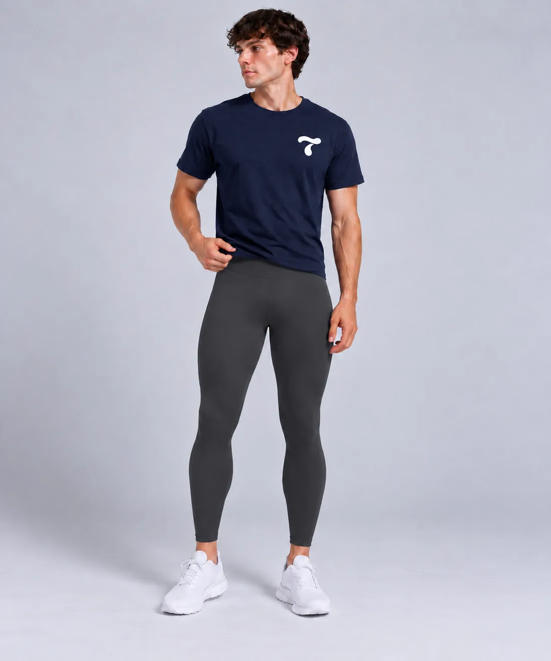 Man wearing charcoal Torasca leggings with a navy t-shirt